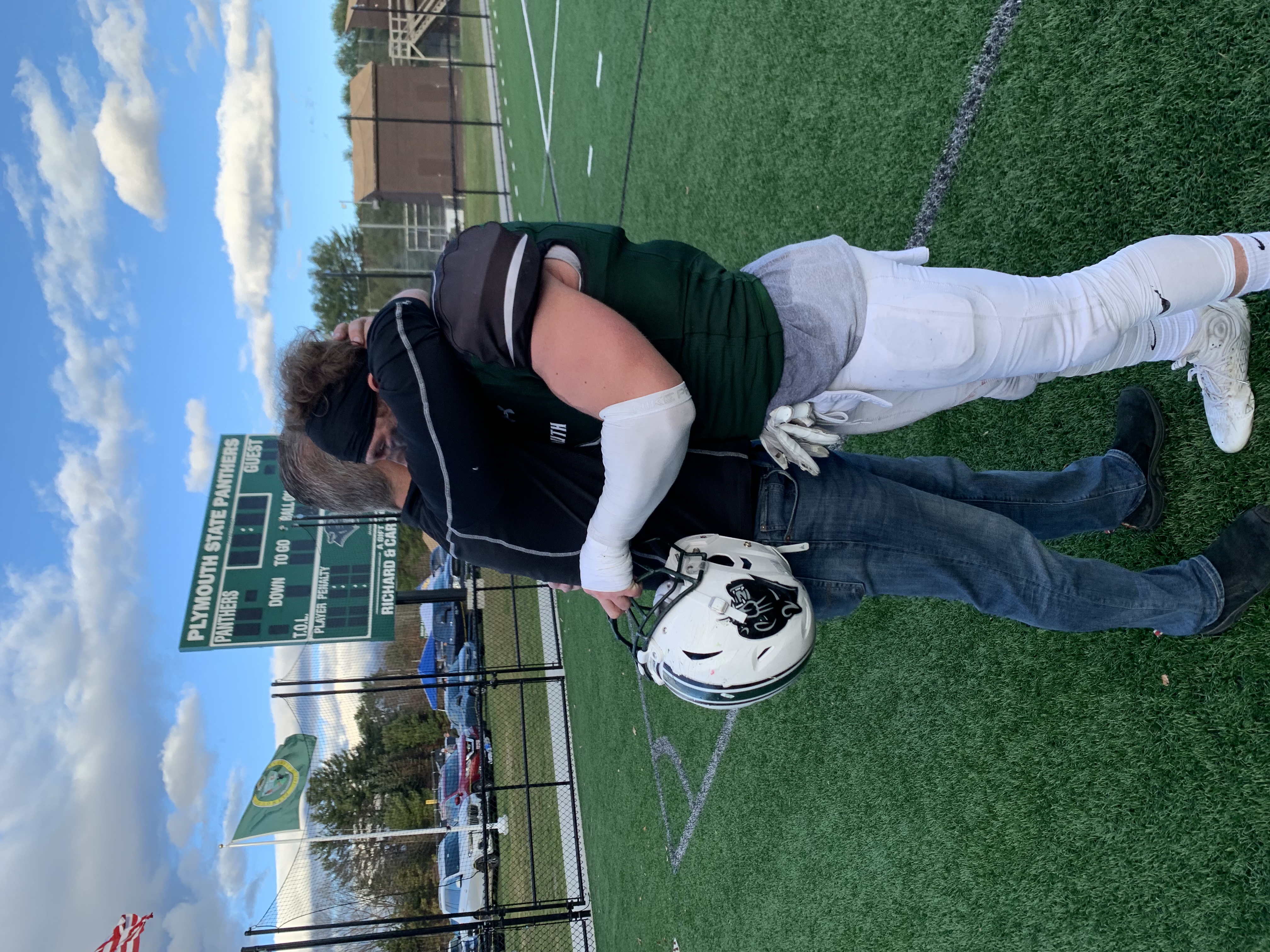 Ryan and his dad on the field