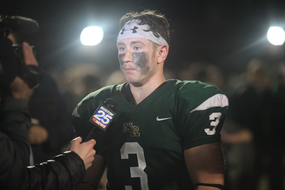Ryan interviewed on the football field